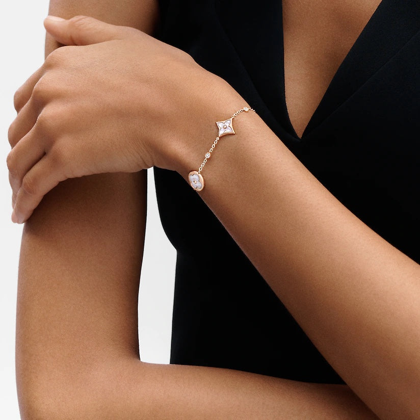 Miro STAR AND SUN 4 MOTIF WHITE MOP PINK GOLD BRACELET