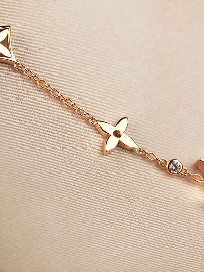 Miro STAR AND SUN 7 MOTIFS GOLD BRACELET
