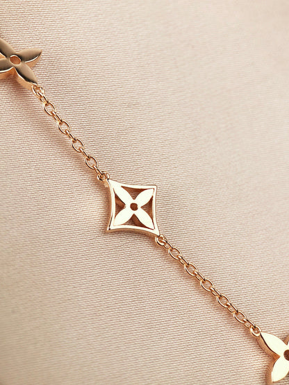 Miro STAR AND SUN 7 MOTIFS GOLD BRACELET