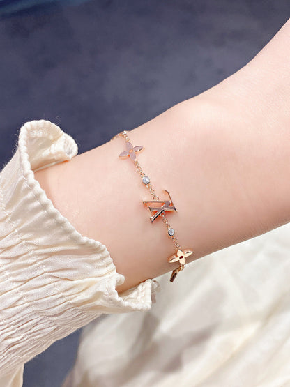 Miro STAR AND SUN 7 MOTIFS GOLD BRACELET