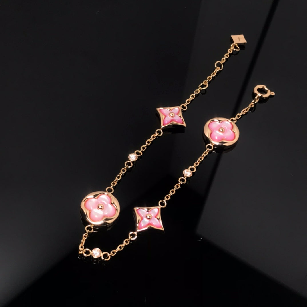 Miro STAR AND SUN 4 MOTIF PINK MOP PINK GOLD BRACELET