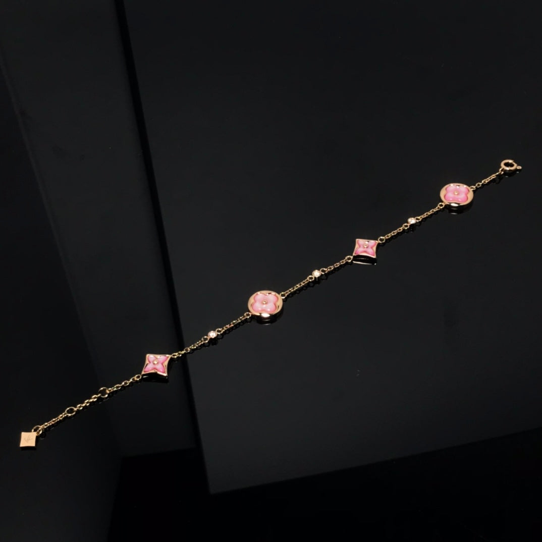 Miro STAR AND SUN 4 MOTIF PINK MOP PINK GOLD BRACELET