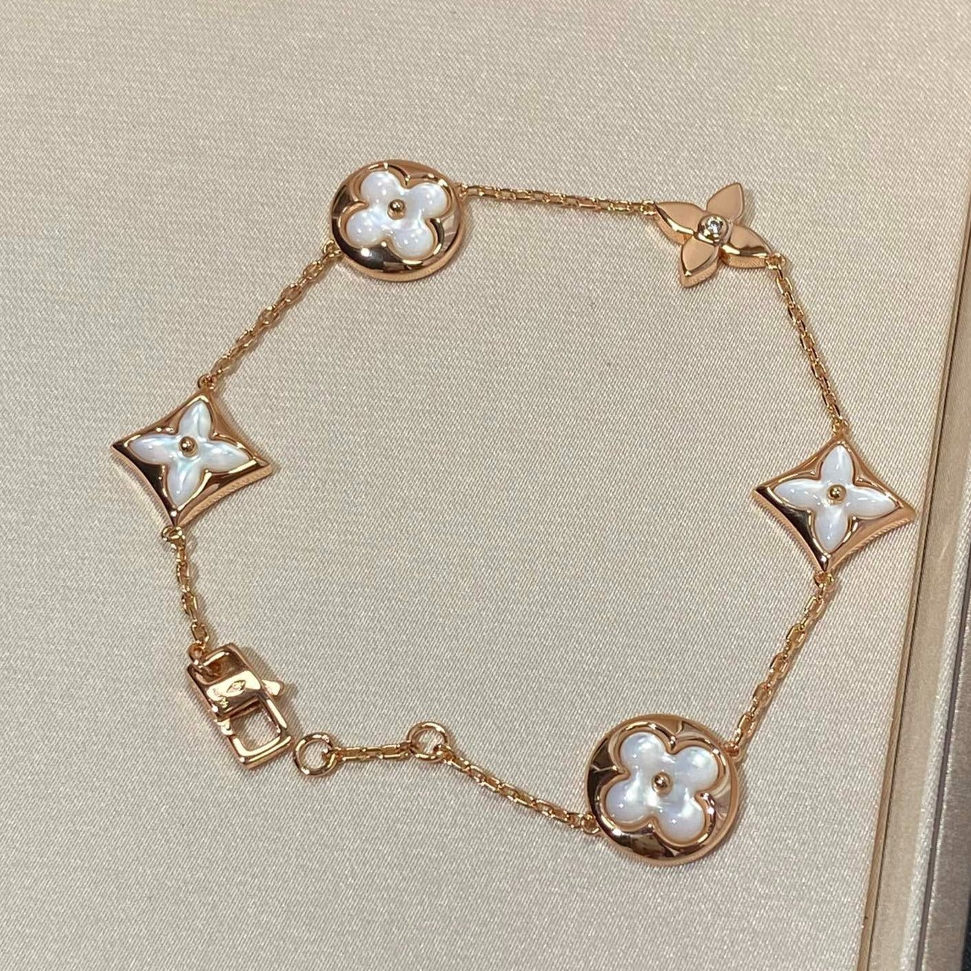 Miro STAR AND SUN 5 MOTIF MOP PINK GOLD BRACELET