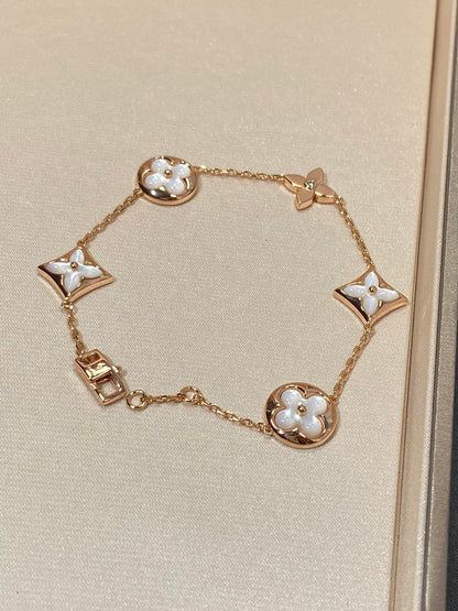 Miro STAR AND SUN 5 MOTIF MOP PINK GOLD BRACELET