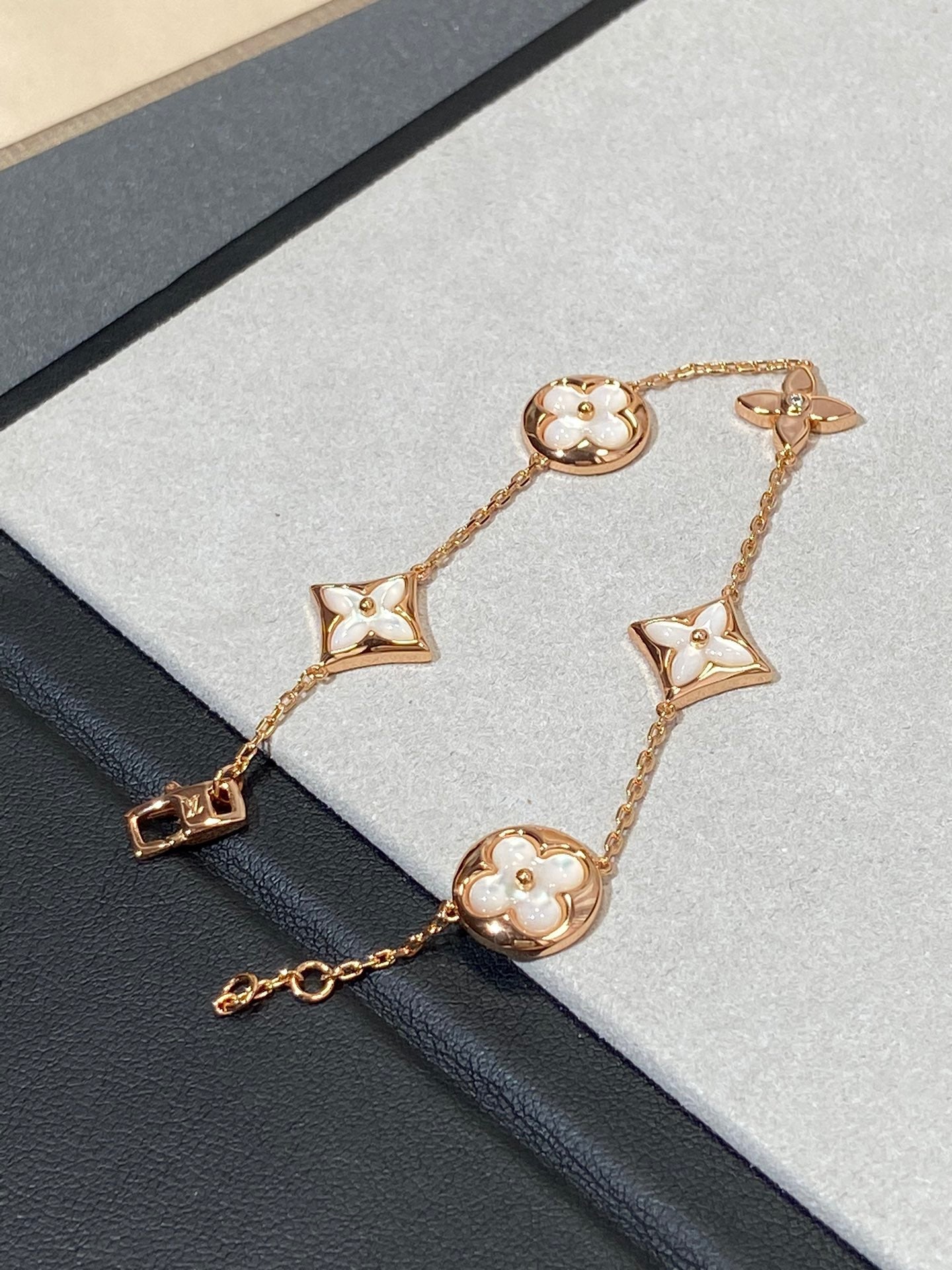 Miro STAR AND SUN 5 MOTIF MOP PINK GOLD BRACELET
