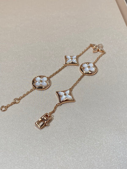Miro STAR AND SUN 5 MOTIF MOP PINK GOLD BRACELET