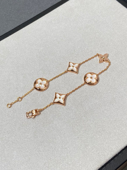Miro STAR AND SUN 5 MOTIF MOP PINK GOLD BRACELET