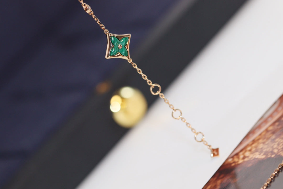 Miro STAR AND SUN 4 MOTIF PINK GOLD MALACHITE BRACELET