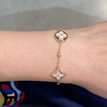 Miro STAR AND SUN 4 MOTIF WHITE MOP PINK GOLD BRACELET