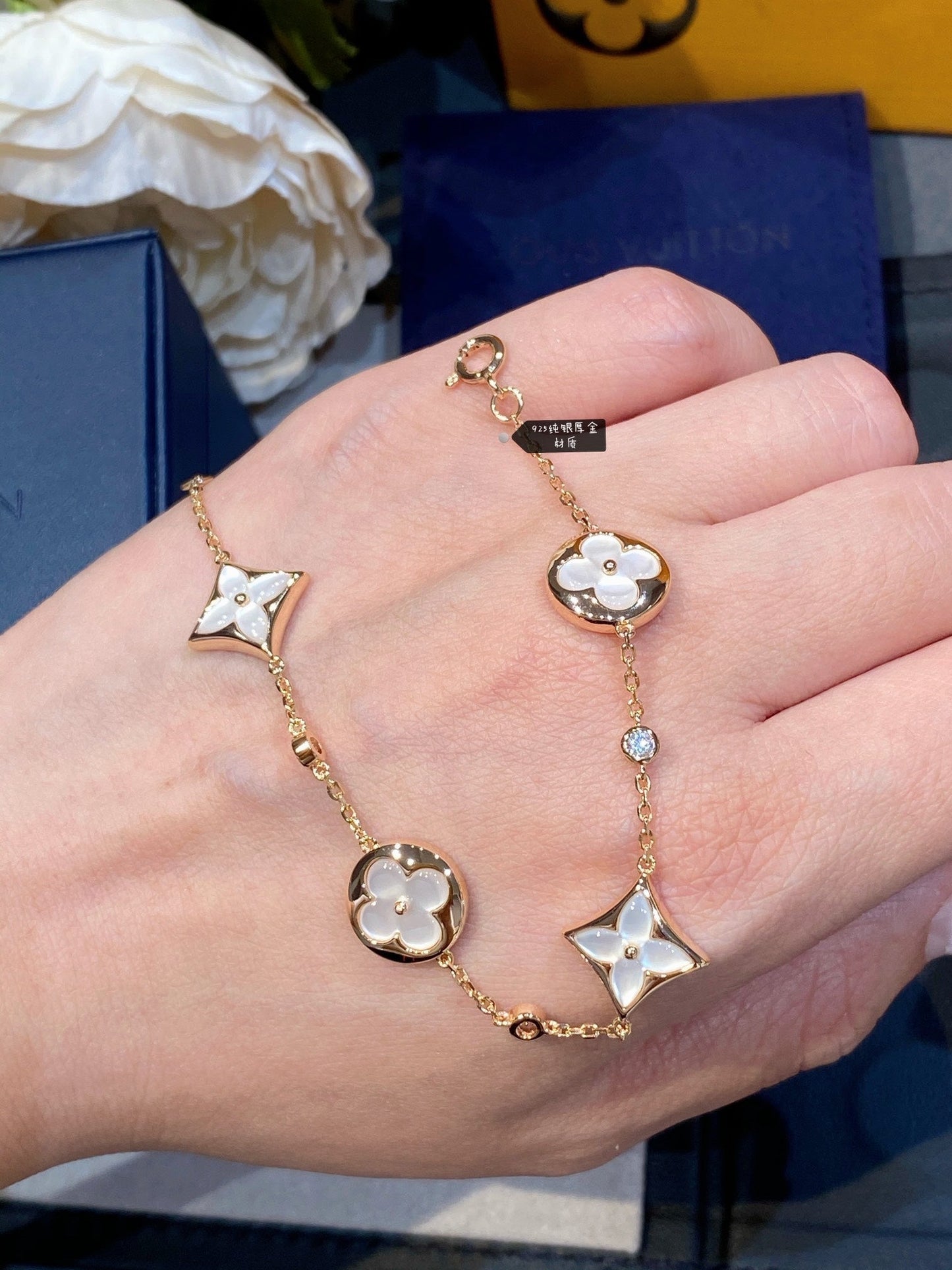 Miro STAR AND SUN 4 MOTIF WHITE MOP PINK GOLD BRACELET