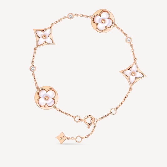 Miro STAR AND SUN 4 MOTIF WHITE MOP PINK GOLD BRACELET