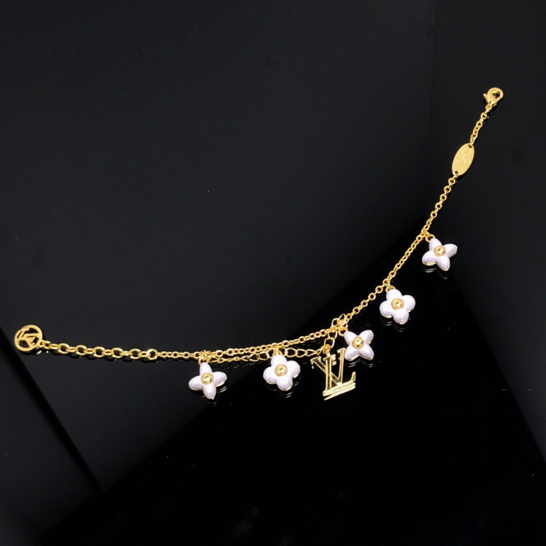 Miro LOGO 6 MOTIF STAR AND SUN GOLD BRACELET