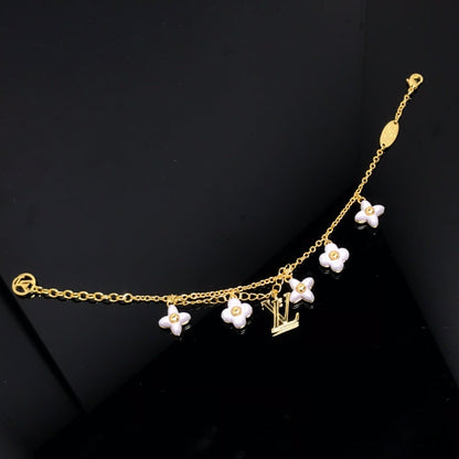 Miro LOGO 6 MOTIF STAR AND SUN GOLD BRACELET