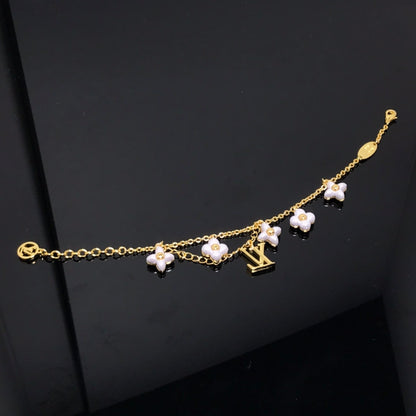 Miro LOGO 6 MOTIF STAR AND SUN GOLD BRACELET