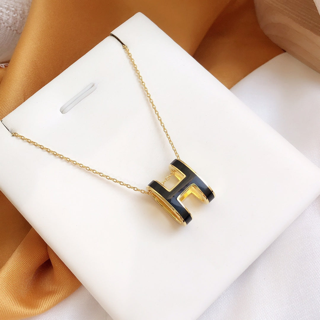 Miro HM CLIC BLACK ENAMEL GOLD NECKLACE