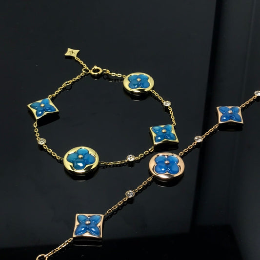 Miro STAR AND SUN 4 MOTIF BLUE BRACELET