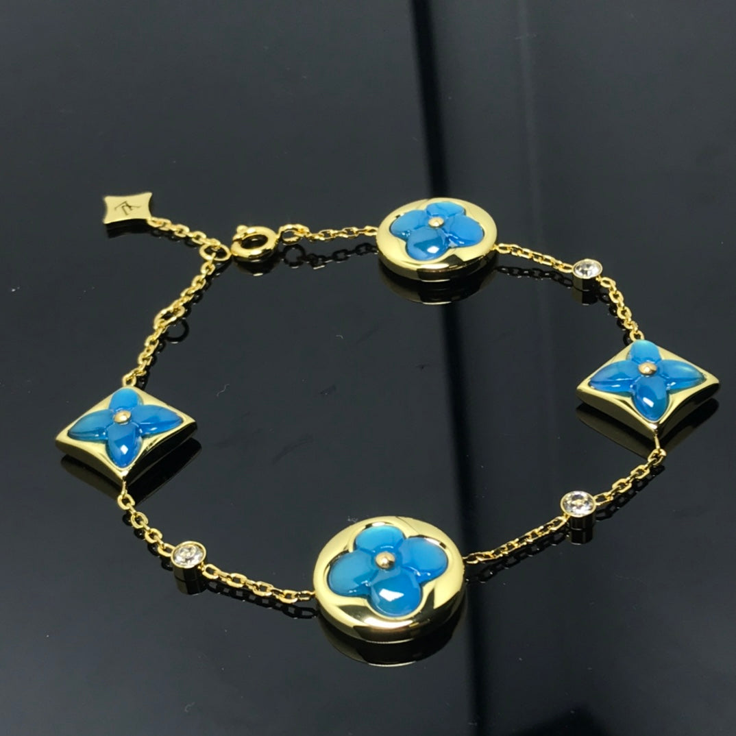 Miro STAR AND SUN 4 MOTIF BLUE BRACELET