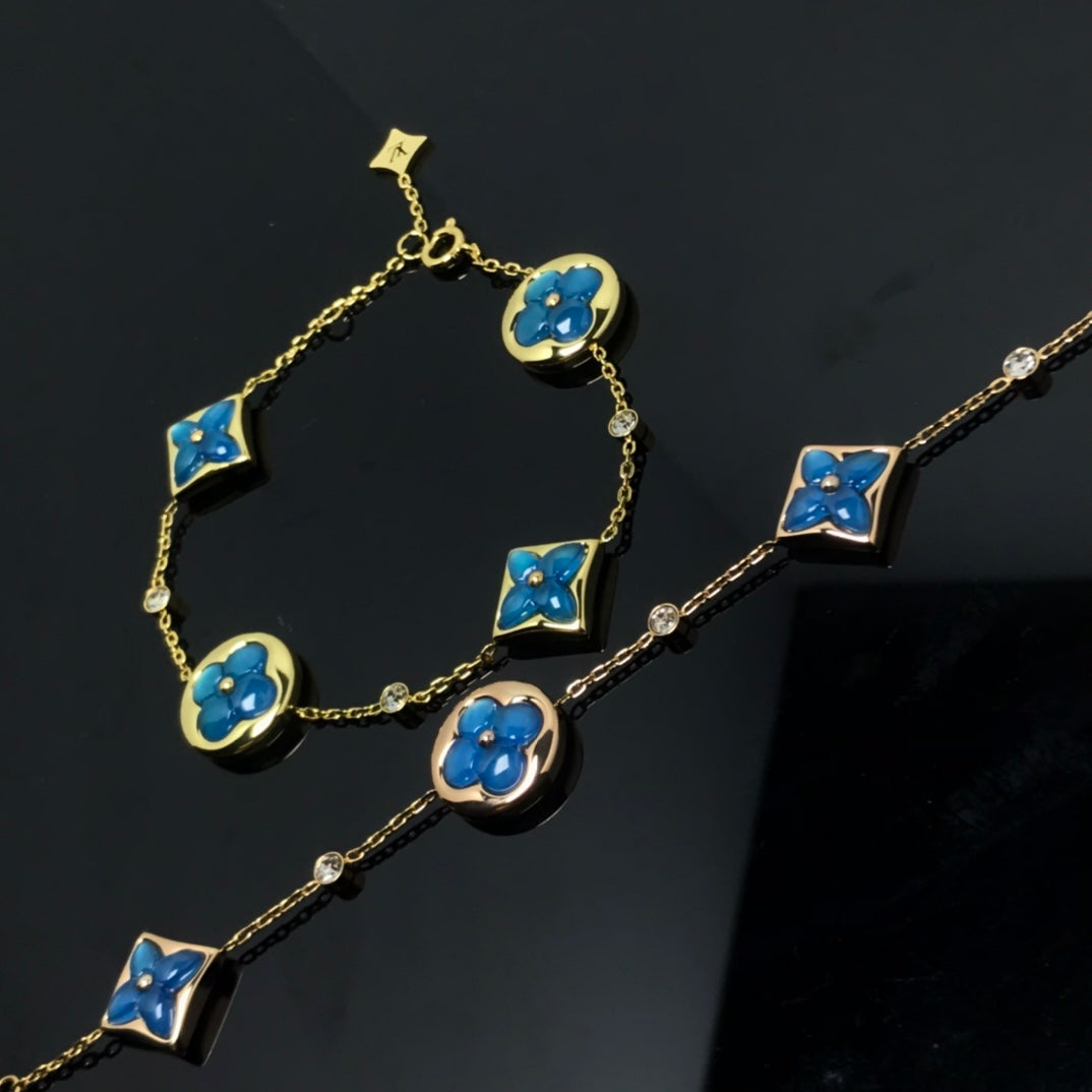 Miro STAR AND SUN 4 MOTIF BLUE BRACELET